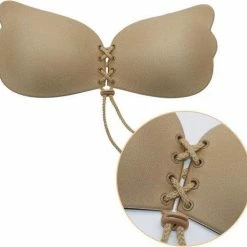 KELERINO. Strapless Plak BH - Vleugels Met Vetersluiting - Cup D / Beige -Badmode Verkoop 550x526 1